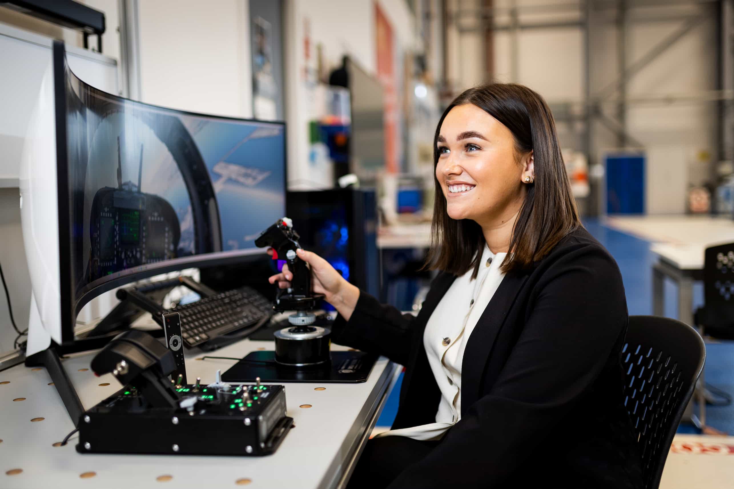 Smiling employee using innovative technology