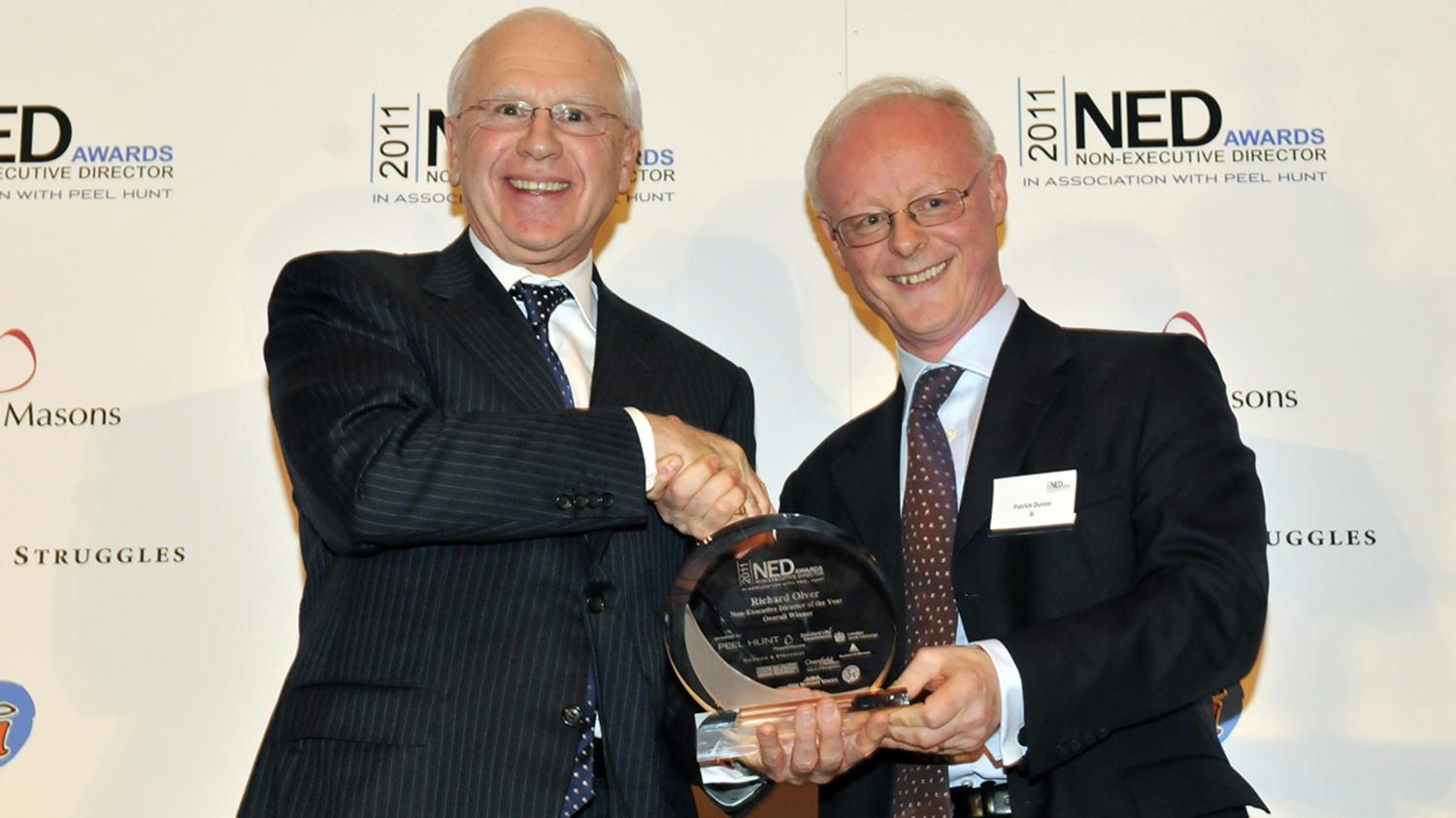 The Chairman collects the NED award from judge Patrick Dunne, Communications Directorof 3i Group Plc