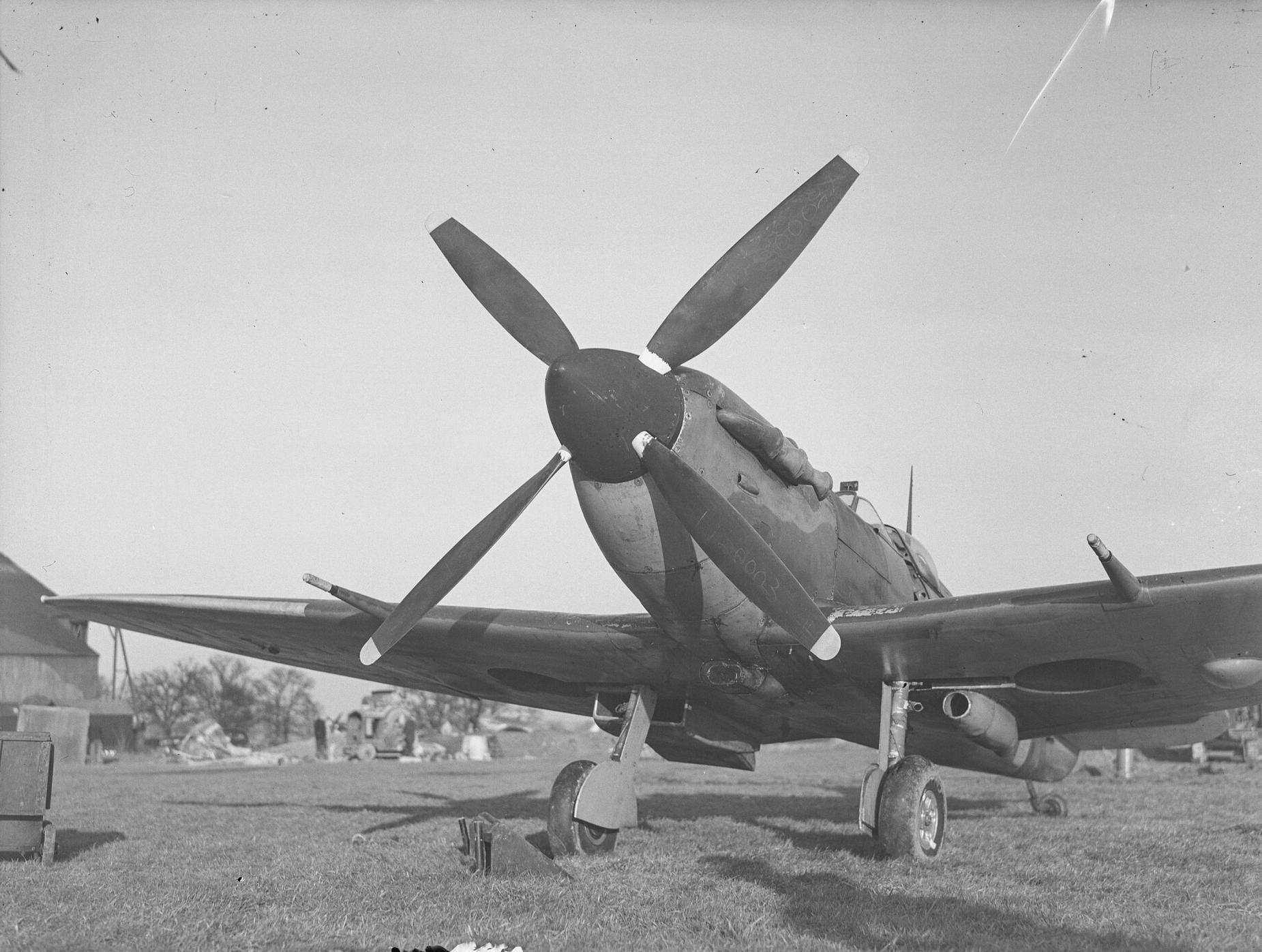 Front view of a Vickers-Supermarine Spitfire with a de Havilland four bladed propeller, on ground.