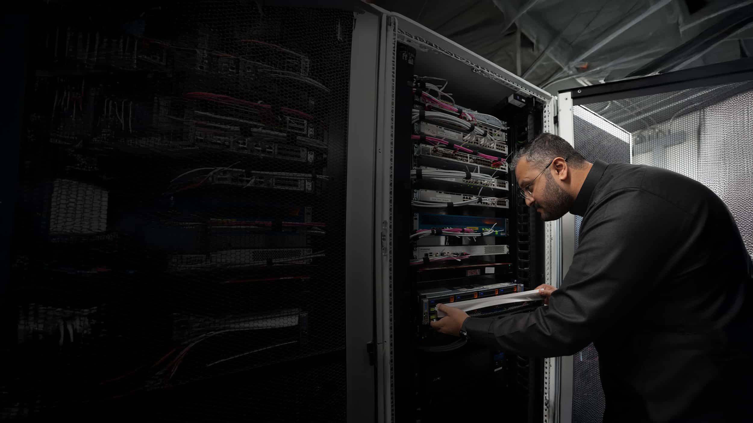 Engineer working on servers