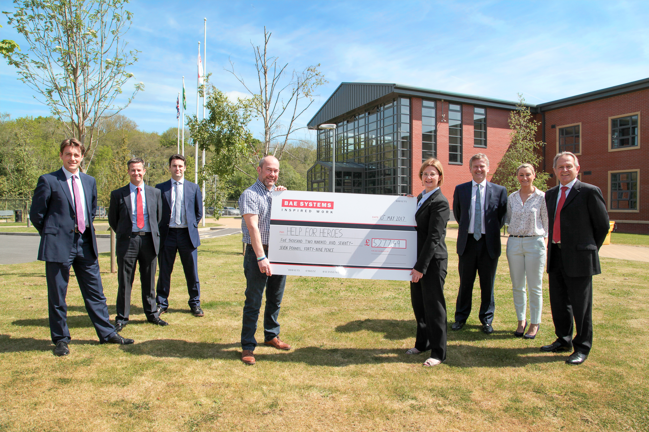 Image of Land (UK) handing over cheque to Help for Heroes