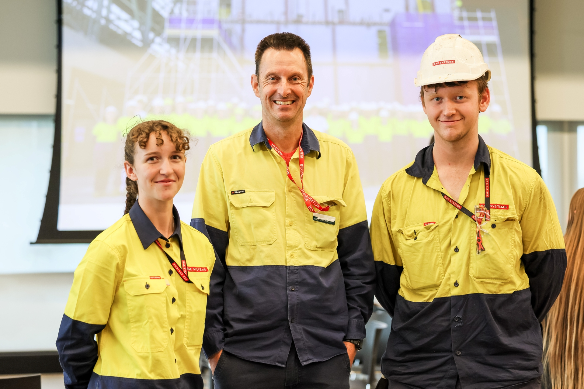 Two ex-Findon Tech apprentices with trainer