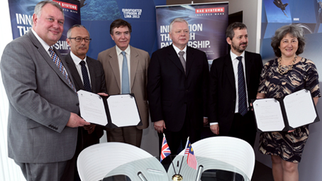 Martin Taylor and Vicki Treadell sign the Memorandum of Understanding