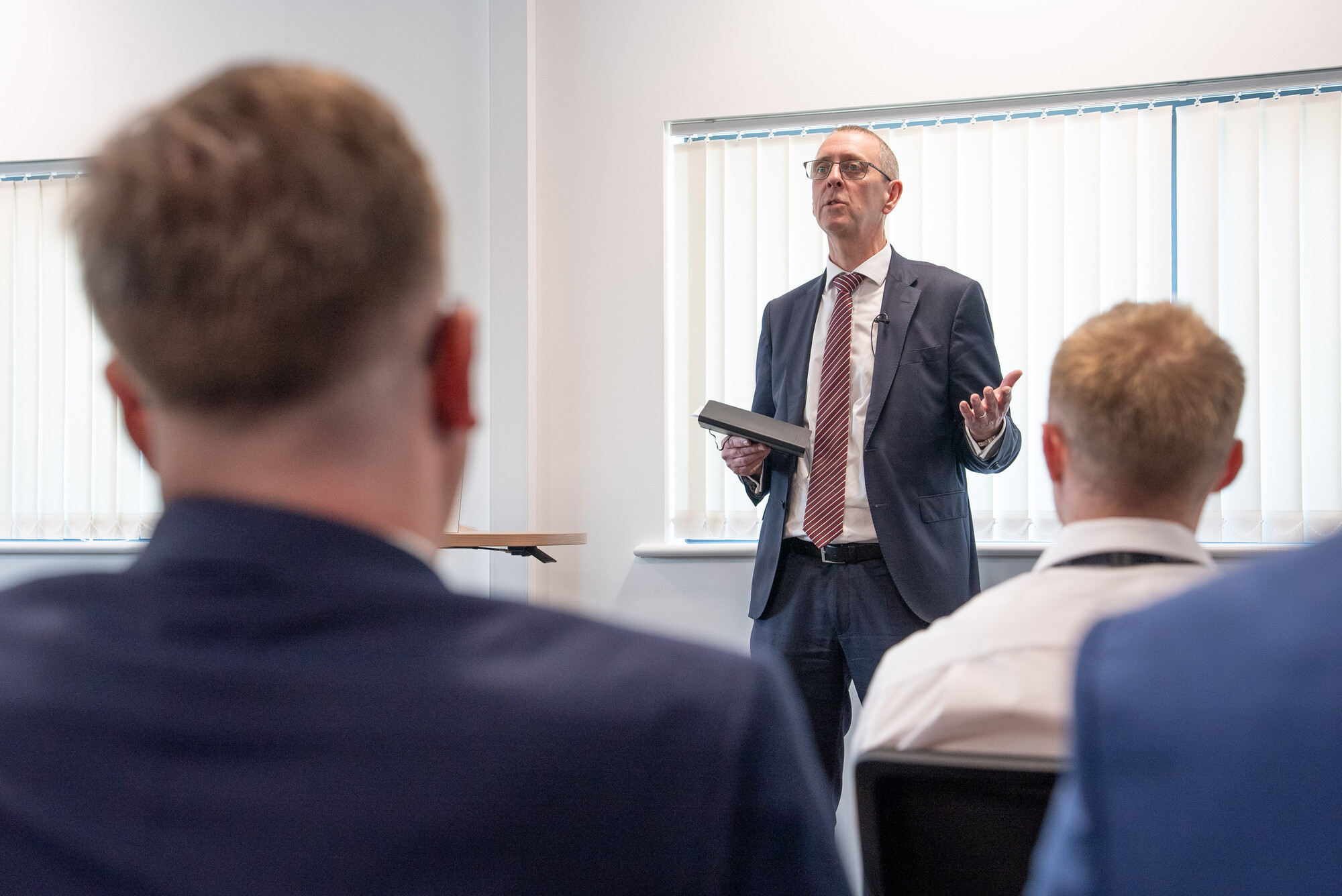 Image of Steve Timms addressing employees