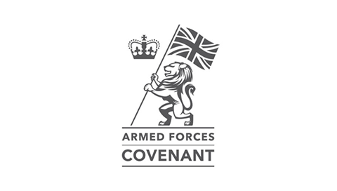 Armed forces covenant's logo of a lion raising a UK flag
