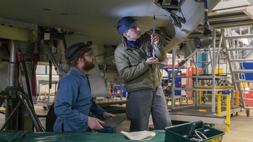 Two support crew working on Typhoon