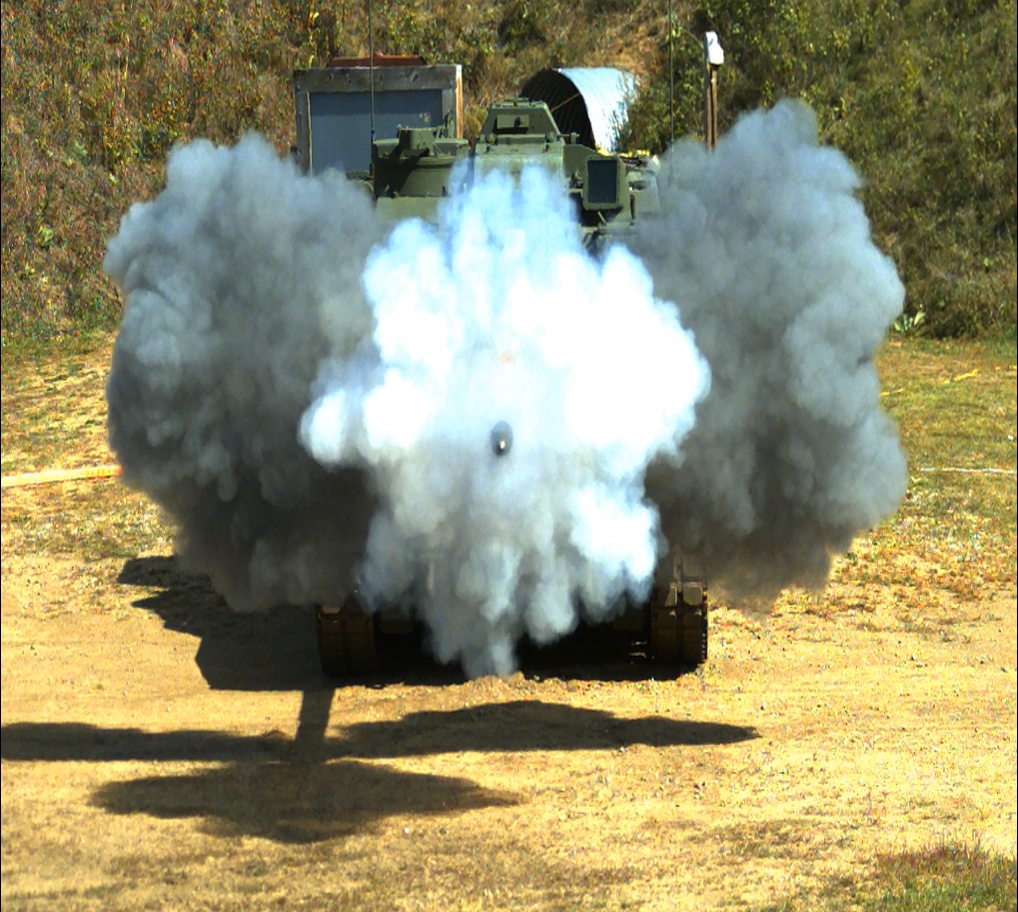 Front view of M109-52 firing during a test fire
