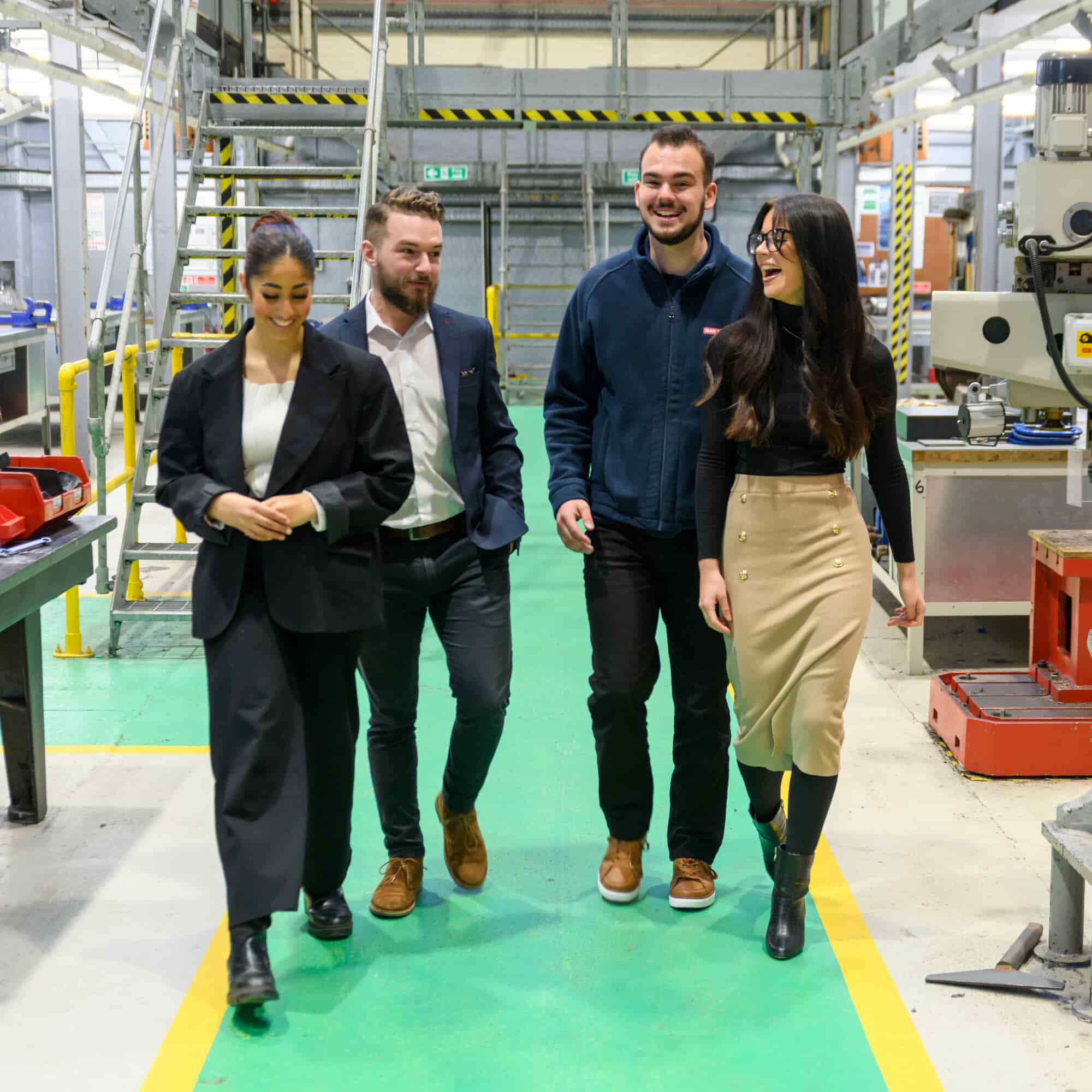 Colleagues on a tour through a workshop