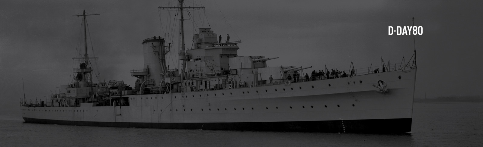 Supporting the largest maritime operation in history. HMS Ajax image courtesy of The Dock Museum.