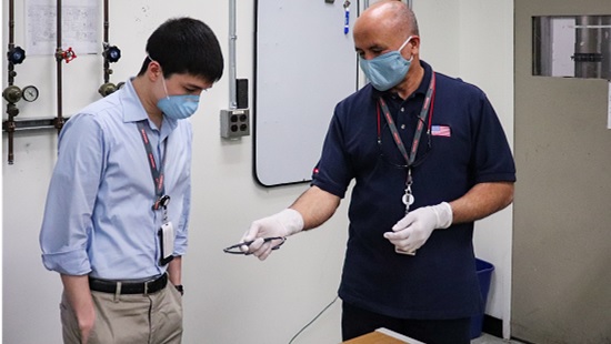 Employees in Manassas, Virginia preparing critical face shield frames for local hospitals.