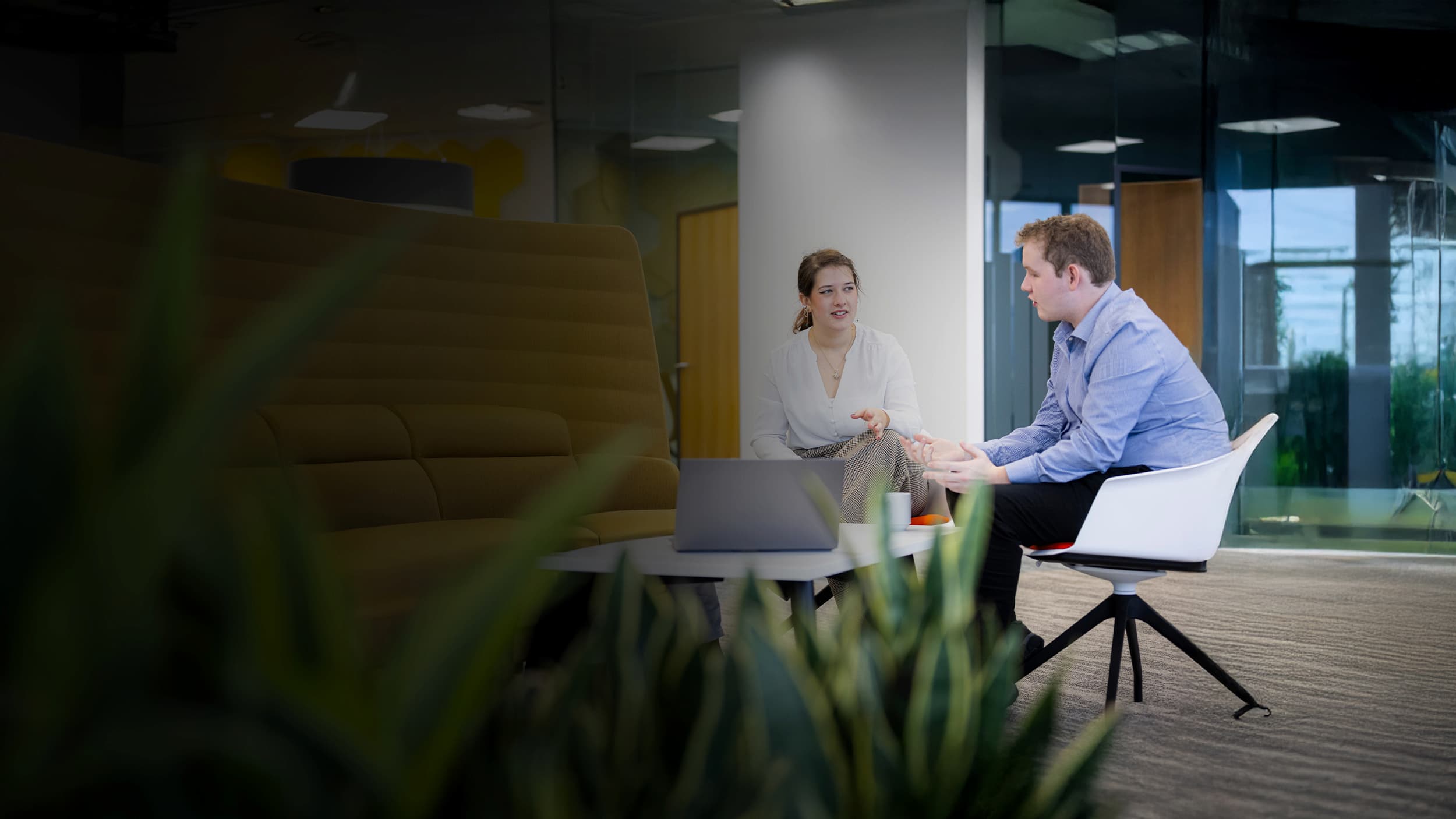 colleagues sitting on chairs