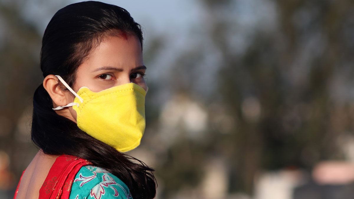 Image showing woman wearing a protective face mask 