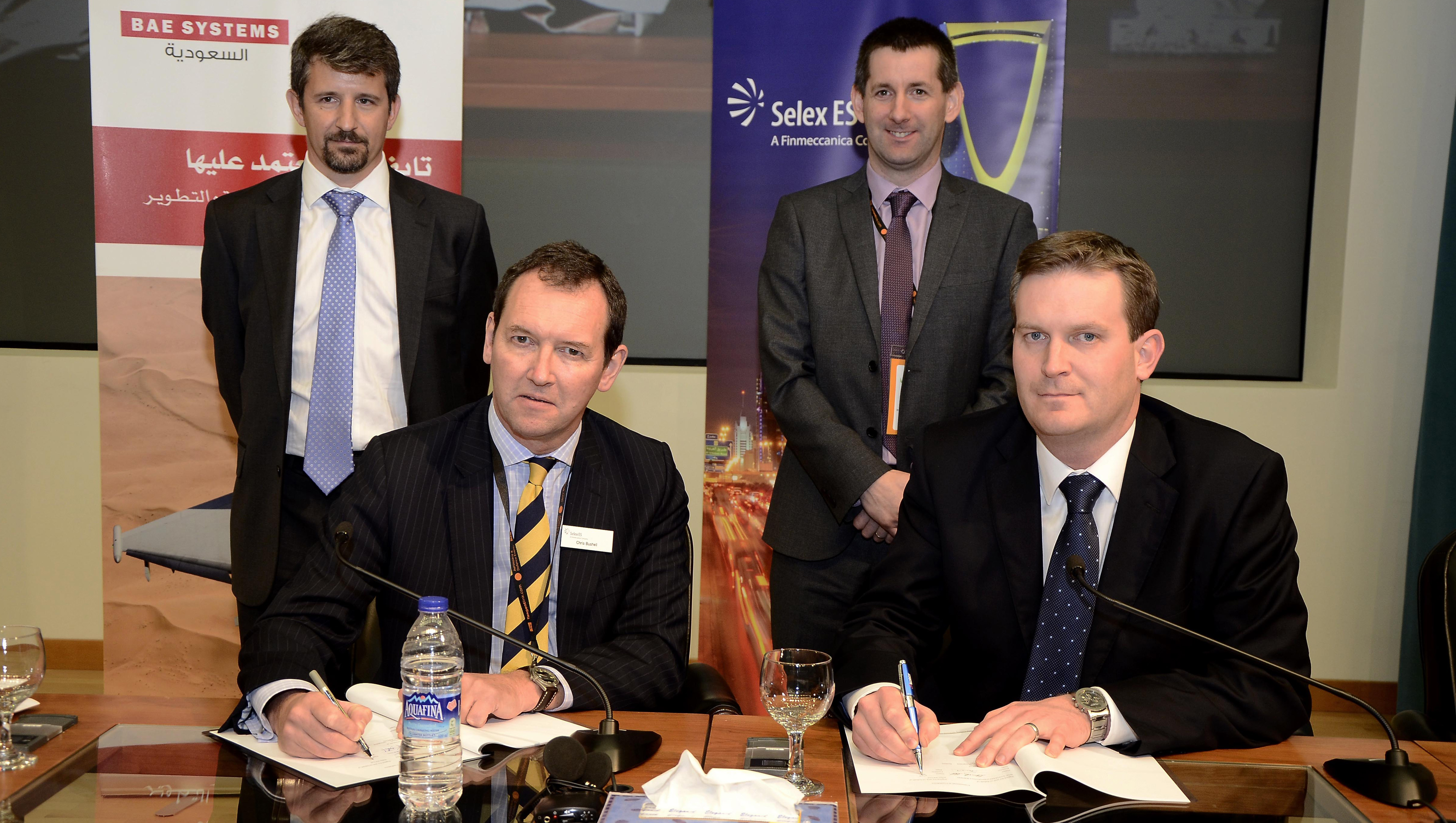 Chris Bushell on behalf of Selex and Richard Hamilton on behalf of BAE Systems, sign the agreement