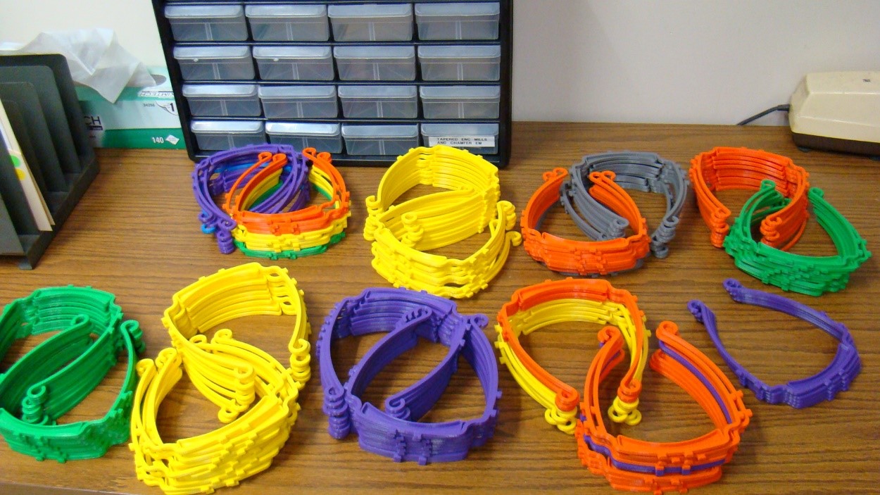  A rainbow assortment of face shield frames created at the Canal St. site in Nashua, New Hampshire.