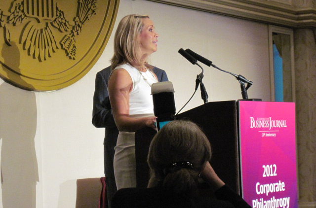 Diane Parisi accepts the 2012 Corporate Philanthropy award on behalf of BAE Systems, Inc.