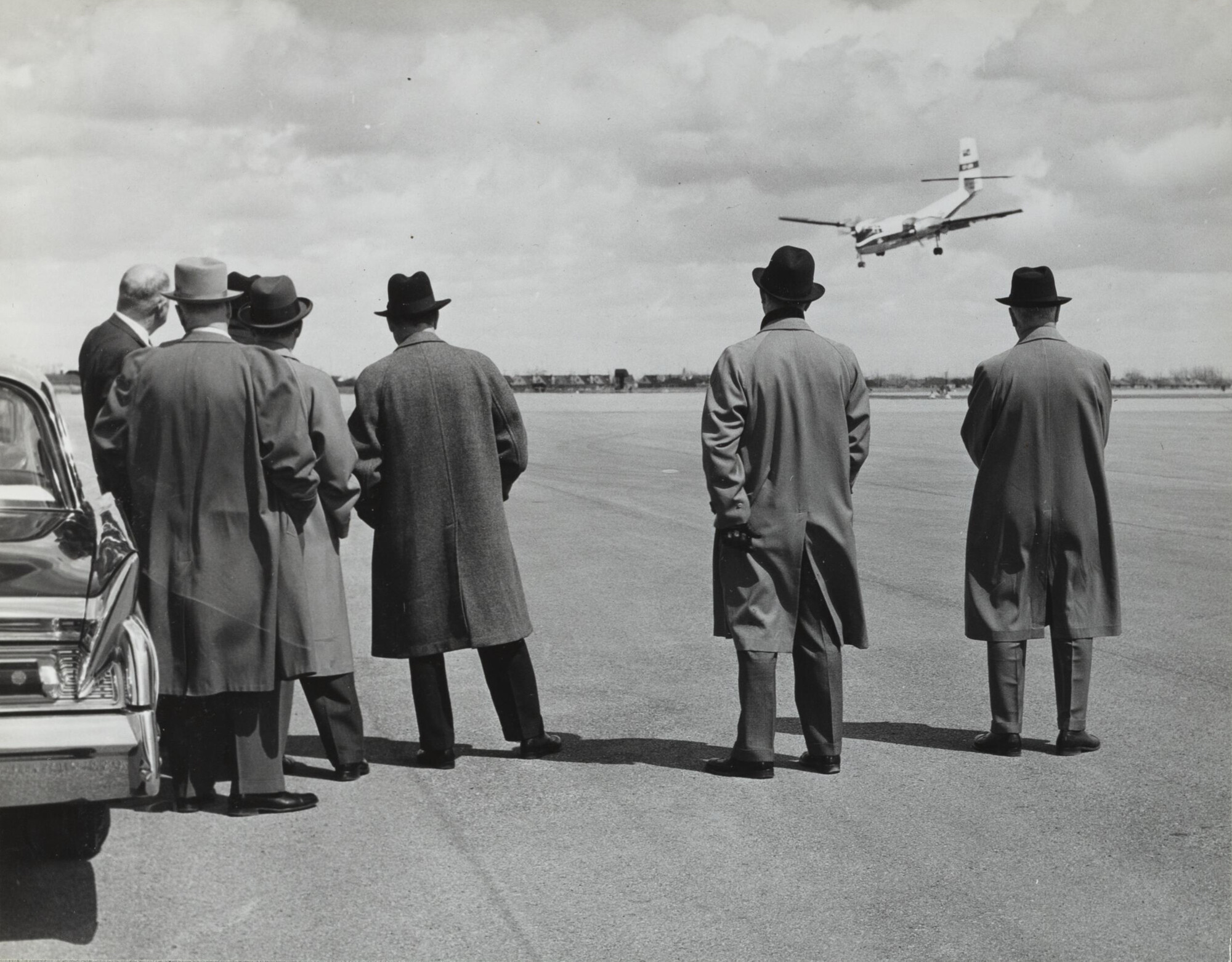 Senior staff from de Havilland Canada, A.V. Roe and Hawker Siddeley, including Roy Dobson, viewing a Caribou demonstration at de Havilland Canada, Downsview, 8th April 1960.