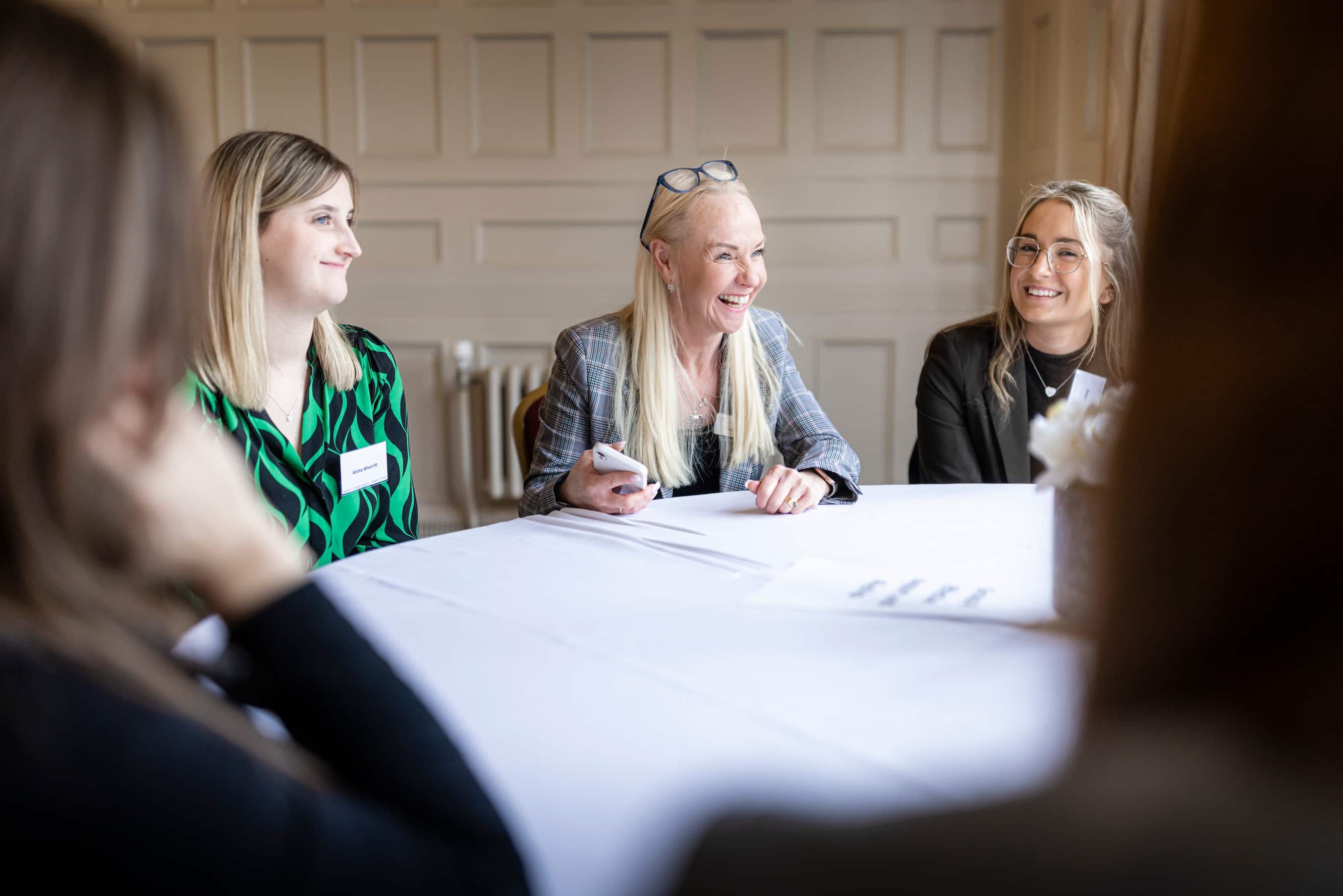 Women talking around a table