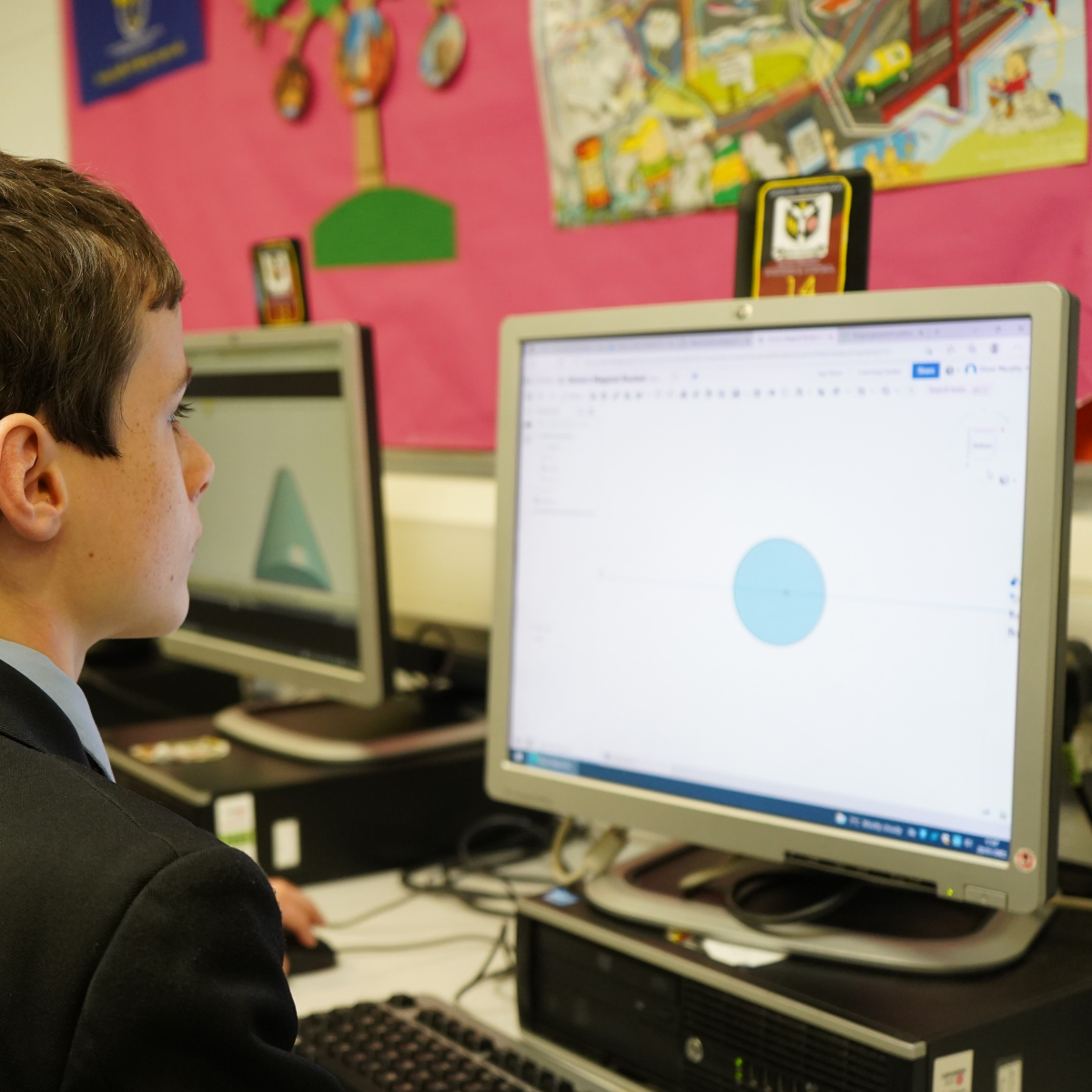 Student using 3D design software