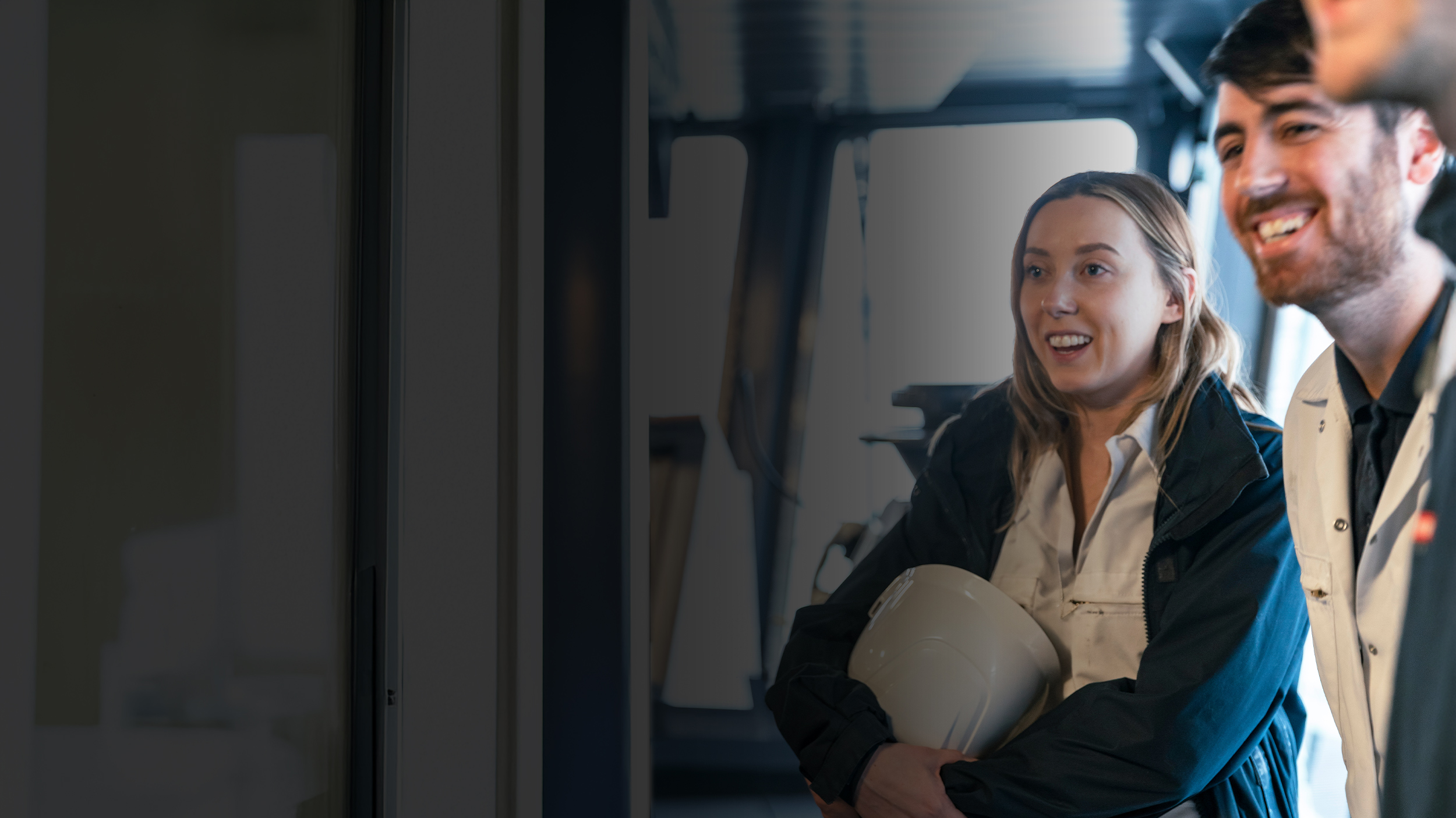 Employees relaxed and laughing within ship
