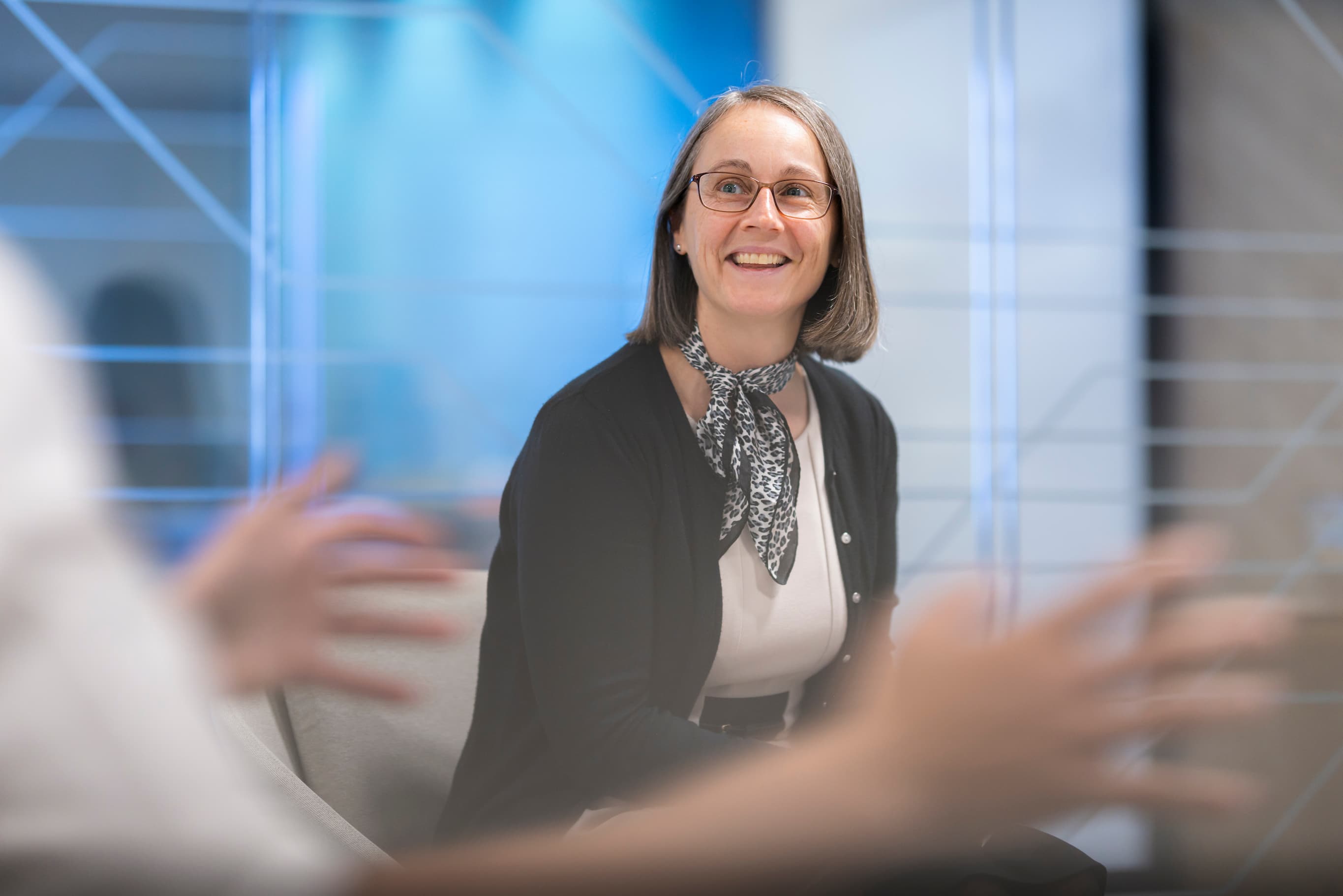 Woman smiling in and office