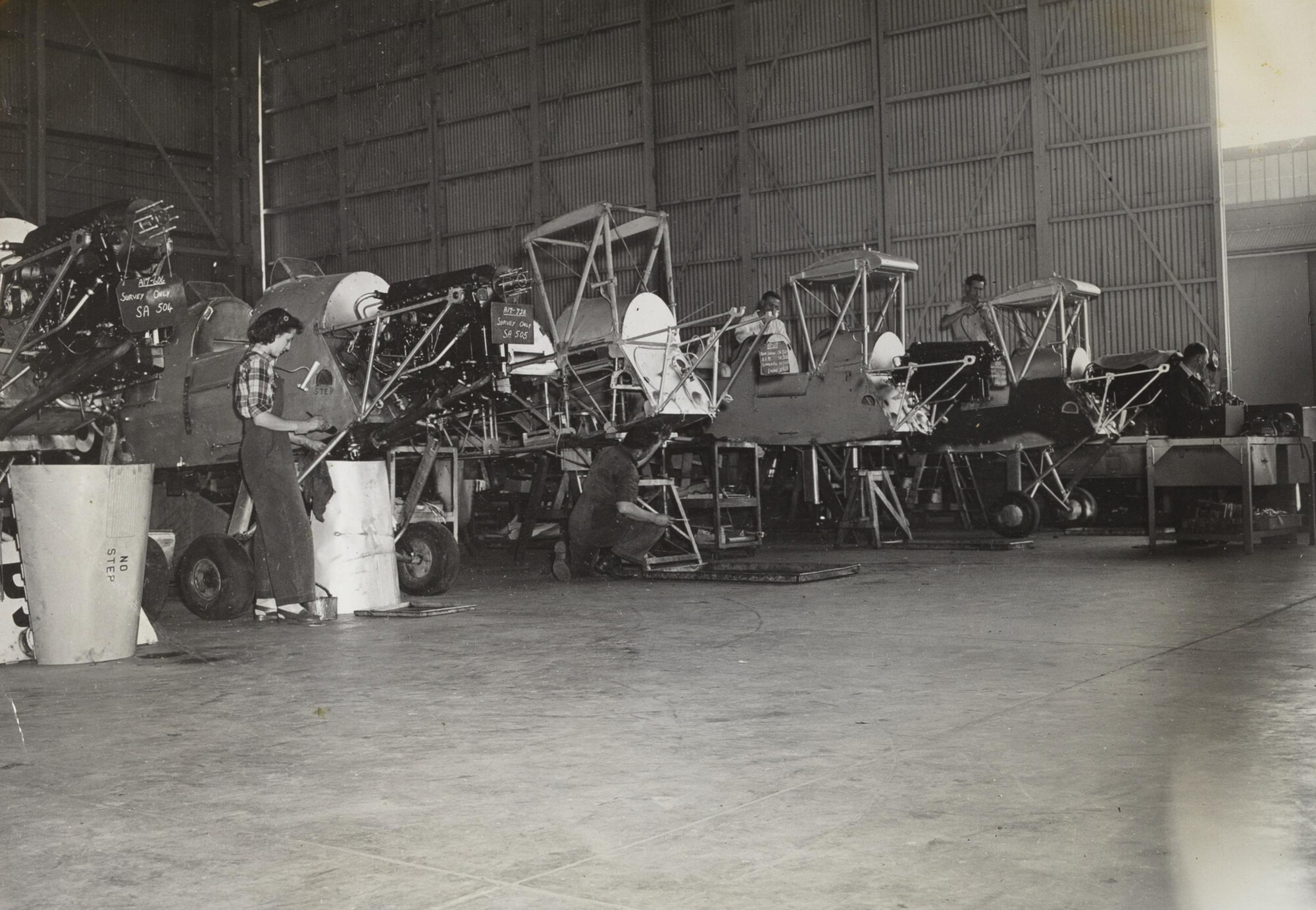 de Havilland DH.82 Tiger Moth elementary trainers belonging to the Royal Australian Air Force, being overhauled by the Service Department of de Havilland Aircraft Pty Limited, Bankstown, N.S.W., Australia, c. 1950.
