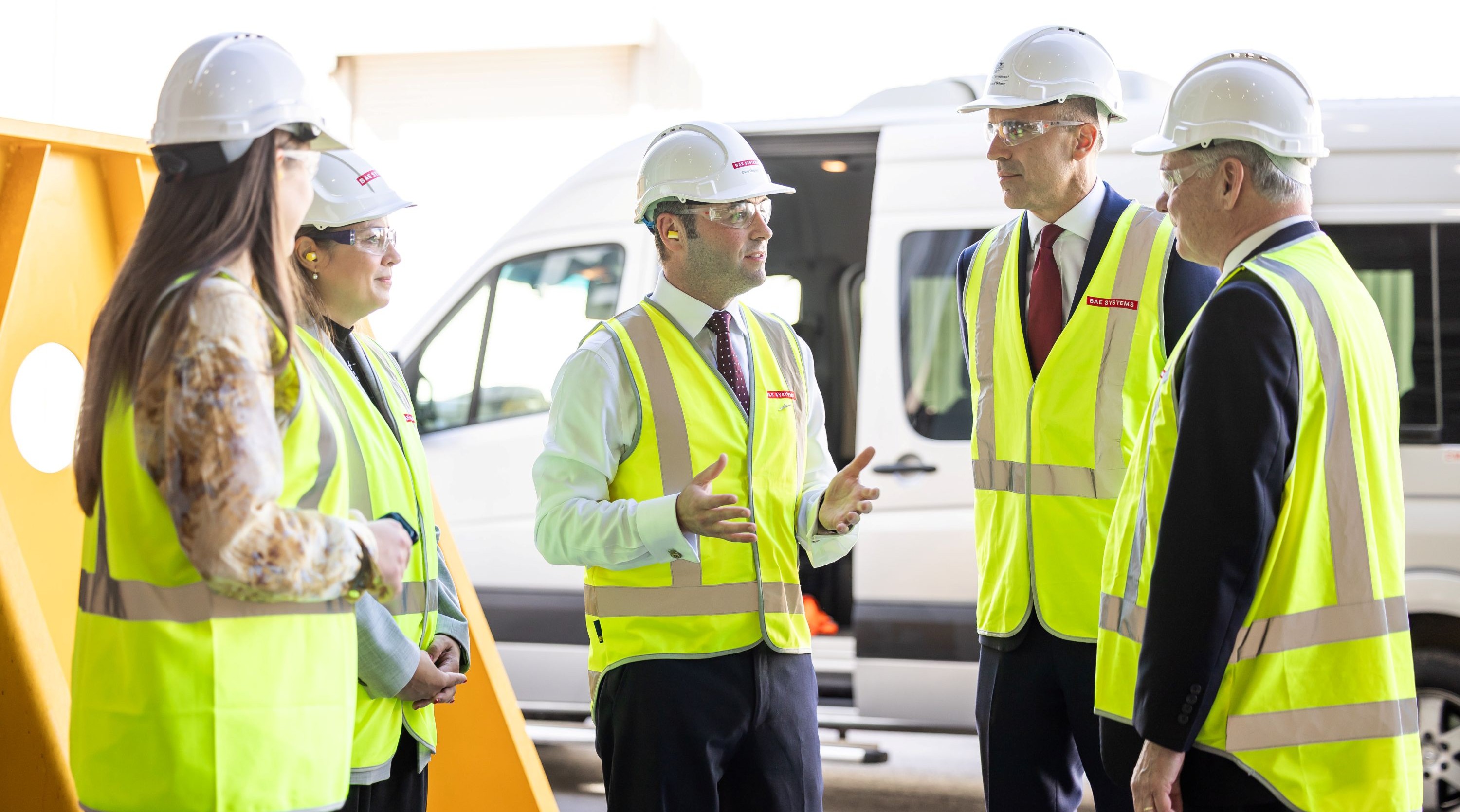 Surface Ships MD David Shephard and SA Premier Peter Malinauskas speaking in a group