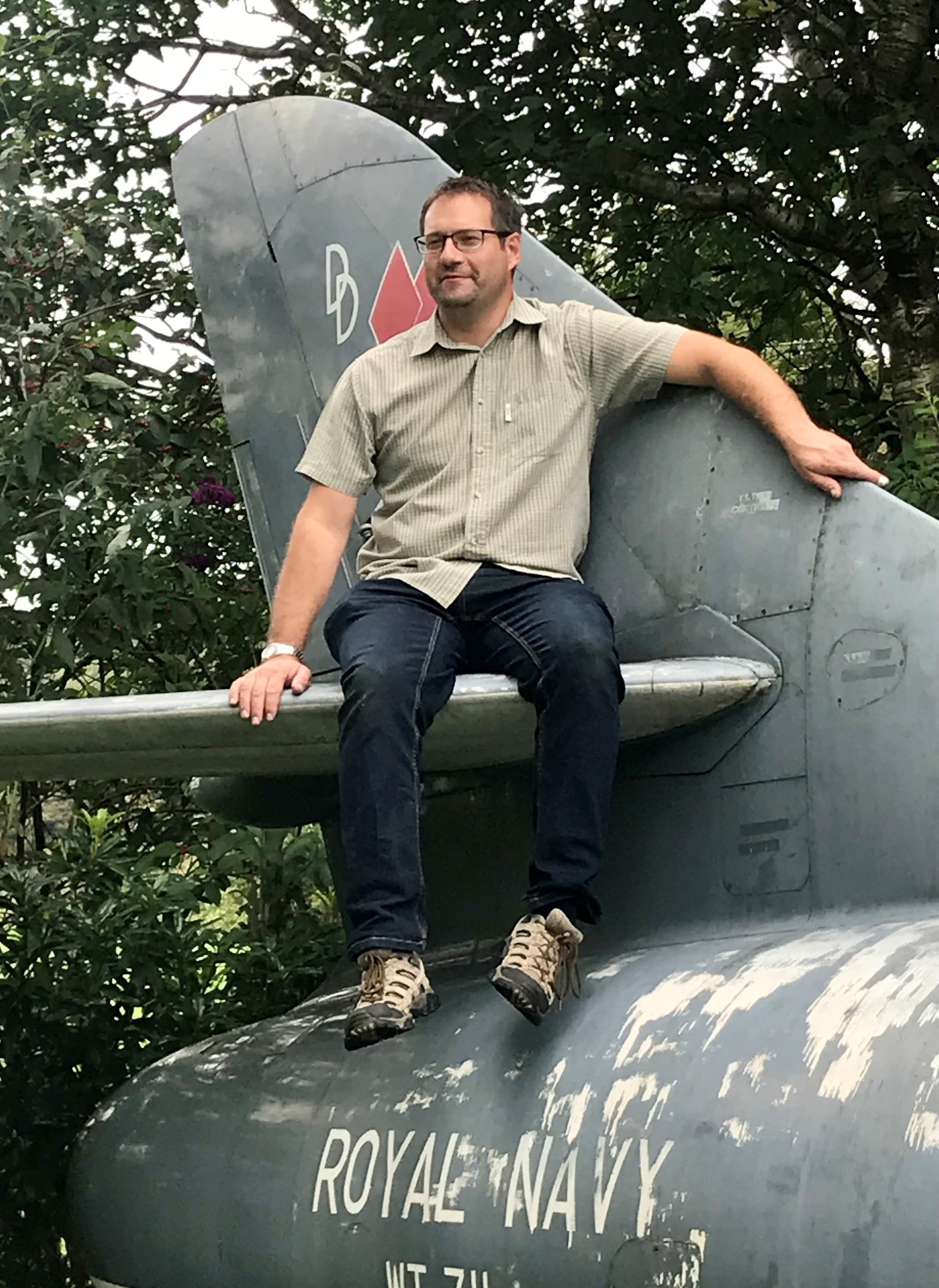 James Amor sat on an aircraft