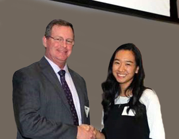 Rick Allen presents scholarship to Sabrina Kim
