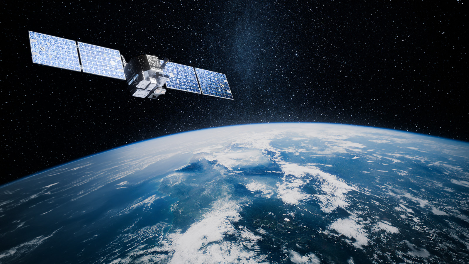 Radiation-hardened satellite orbiting Earth sending communications signals