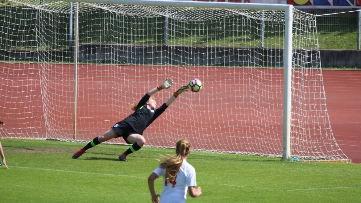 Emma saves a goal whilst playing for England Youth team