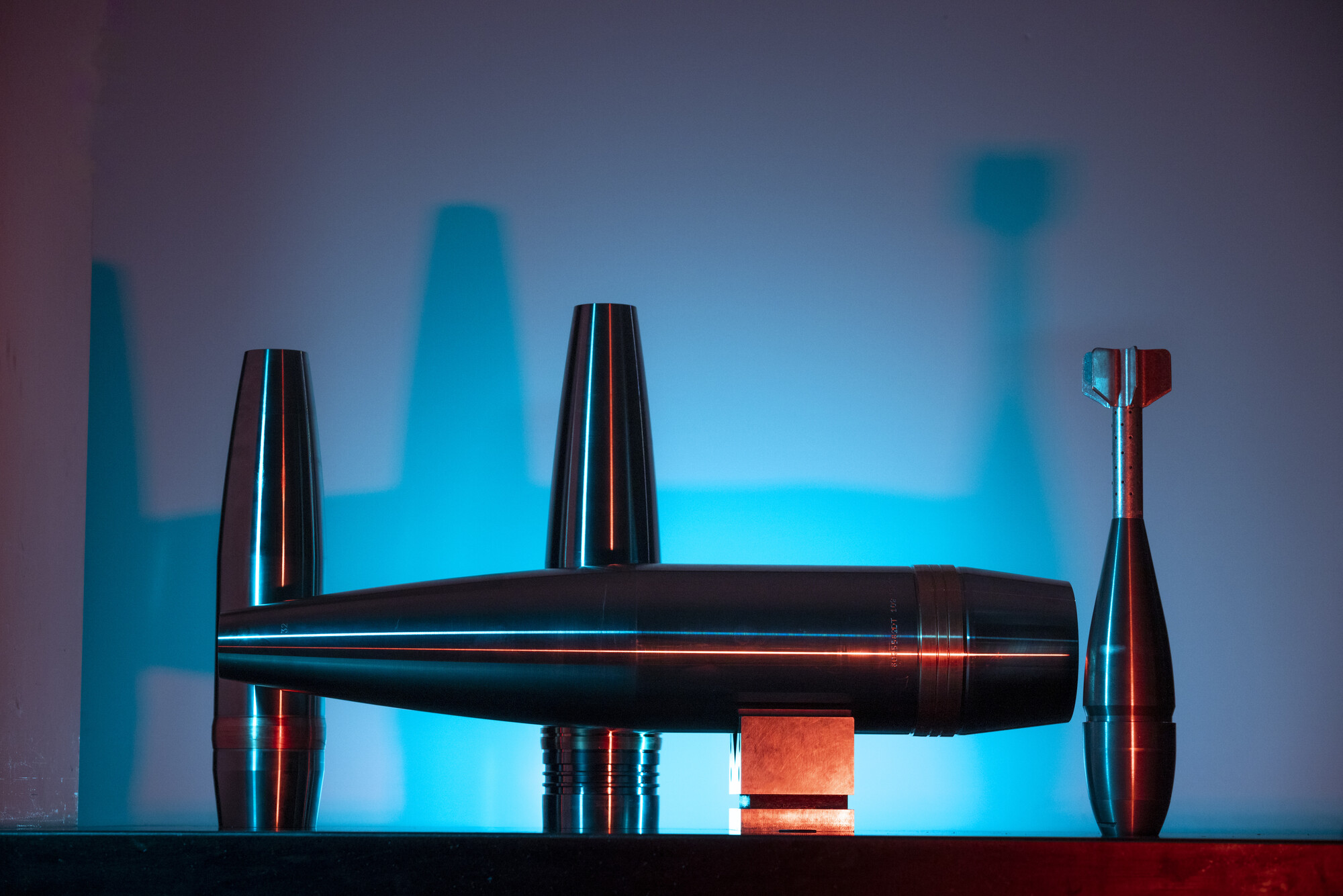 Image of precision munitions on blue background