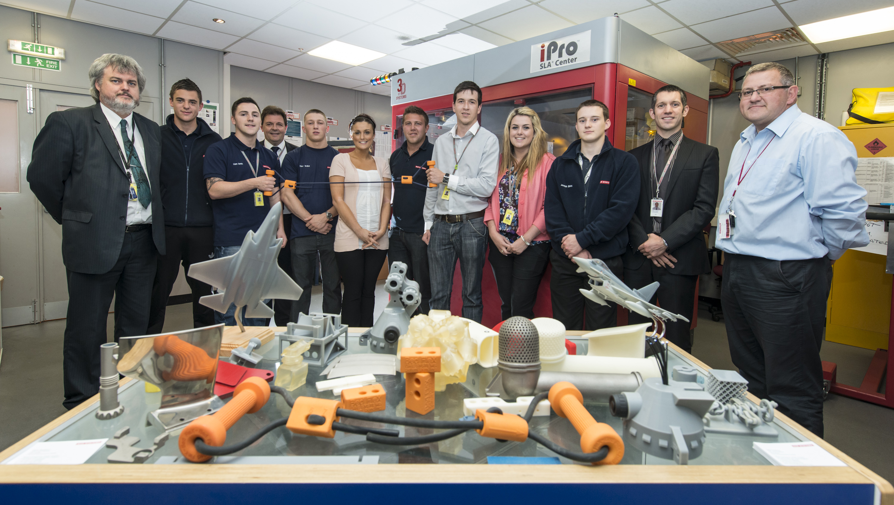 Our BedFleX Team with the BedFleX device and a range of other components made using a revolutionary new ‘3D’ printing process – the parts are literally ‘grown’ in the machine seen here behind the grou