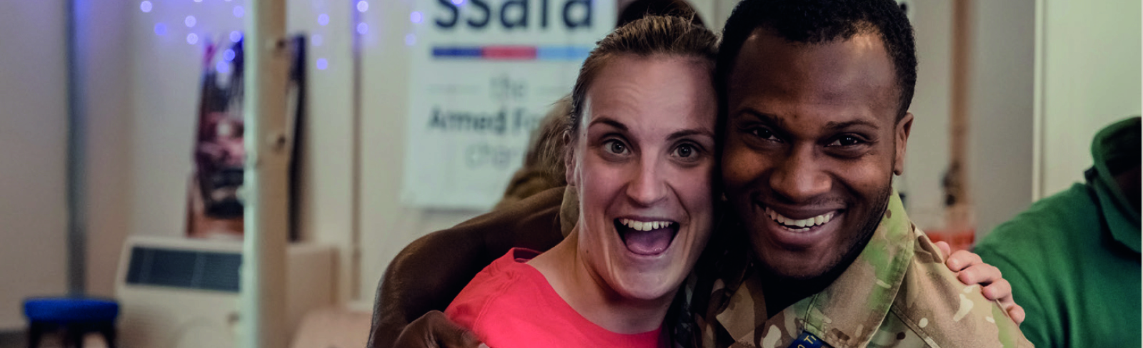 Veteran hugging volunteer 