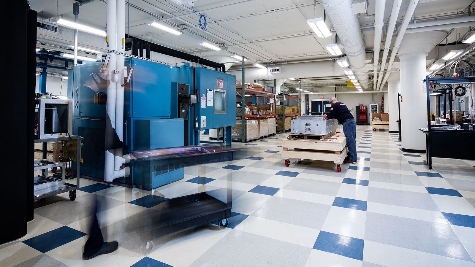 BAE Systems employees working on product in the electrification lab.