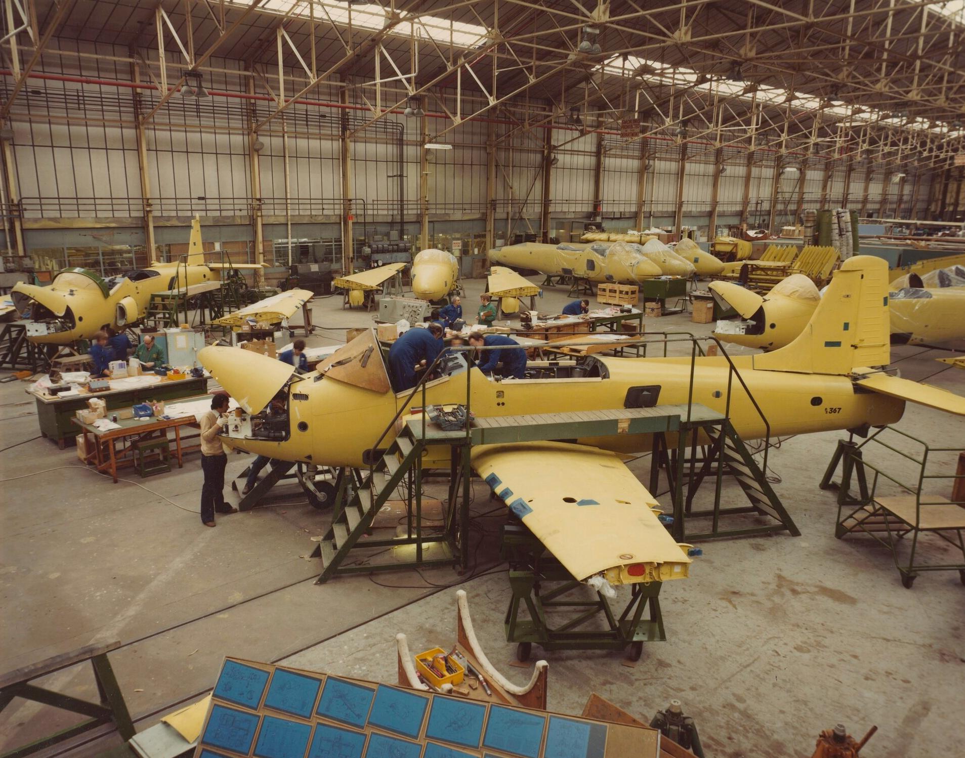 The first British Aerospace Strikemaster to be assembled at the Hurn factory nearing completion on the production line, September 1980.
