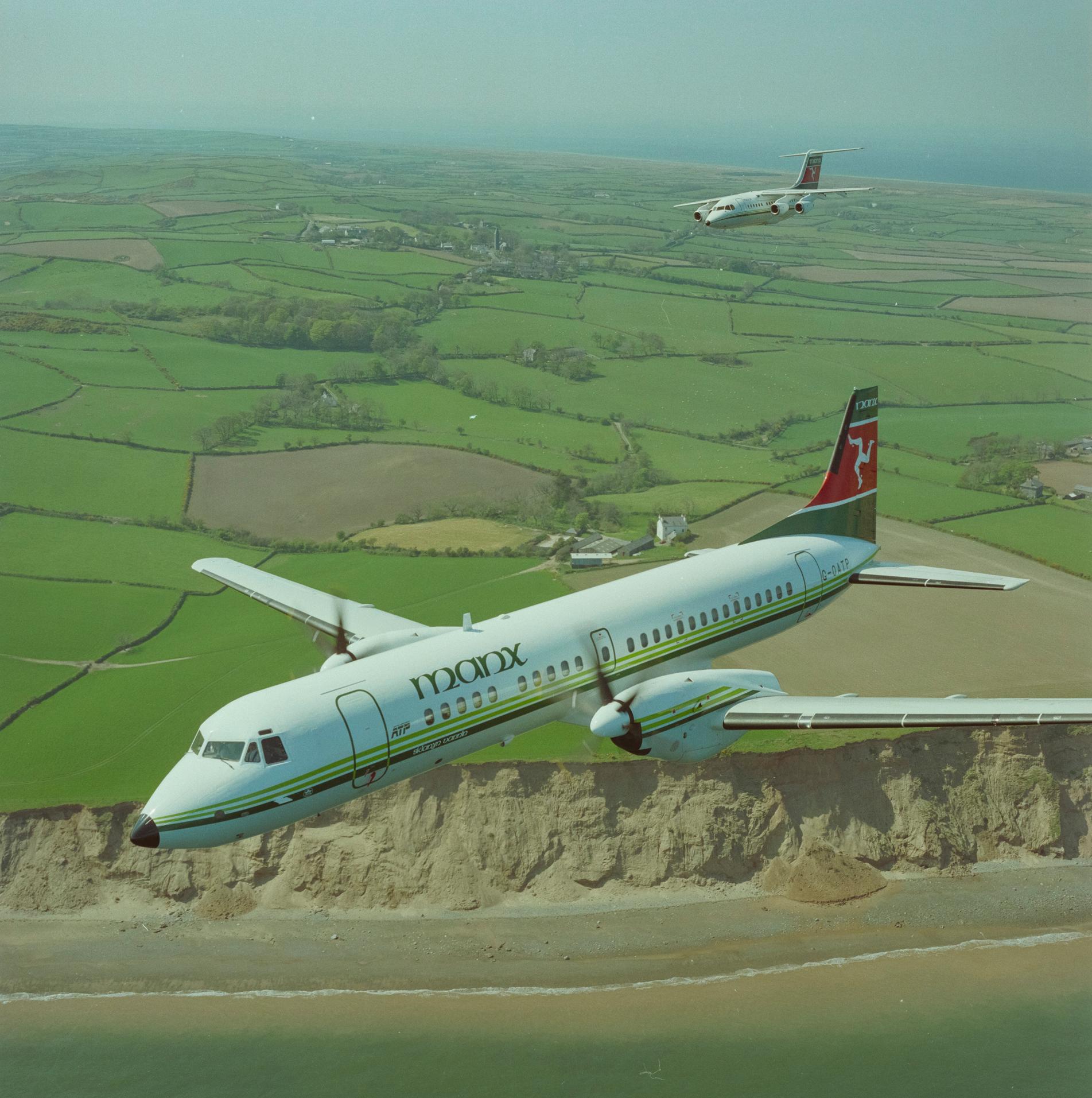 Manx Airlines ATP and BAe 146 RJ80 in flight, c. 1990.