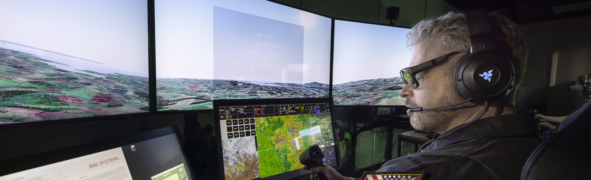 Pilot operating a synthetic trainer