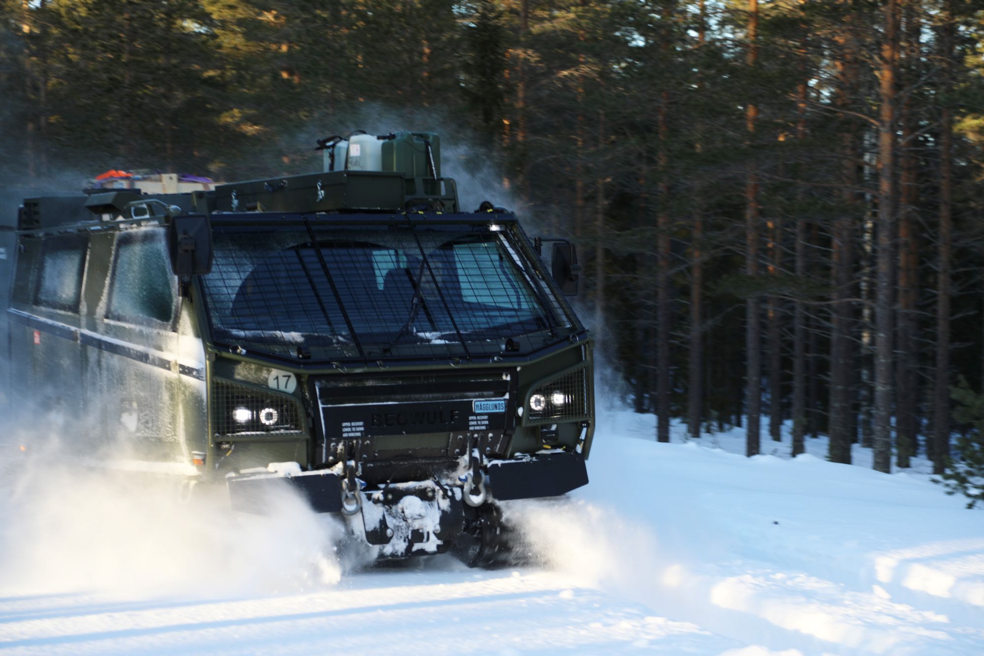 CATV going through the snow covered trails