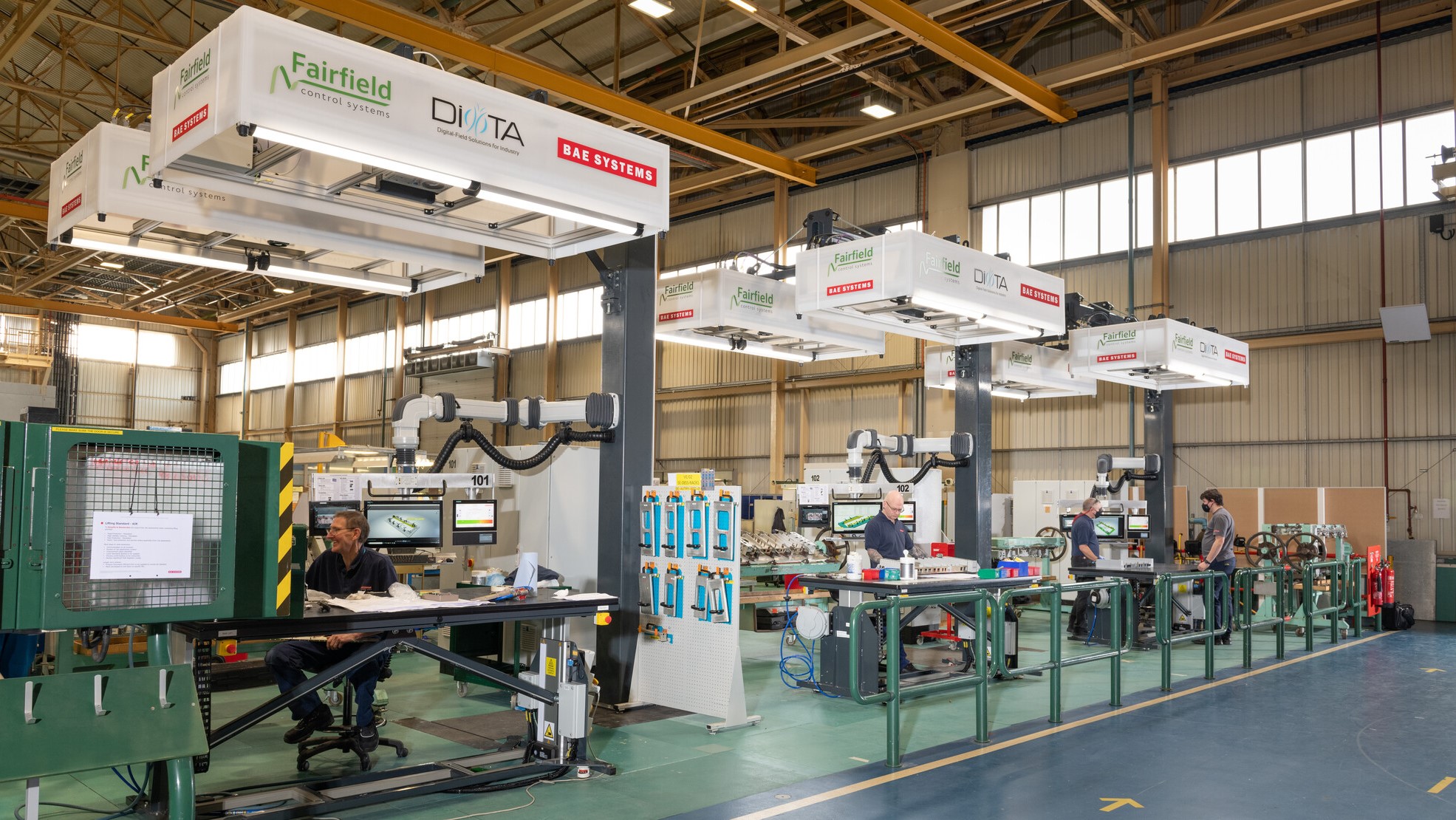 Employees working inside the hangar
