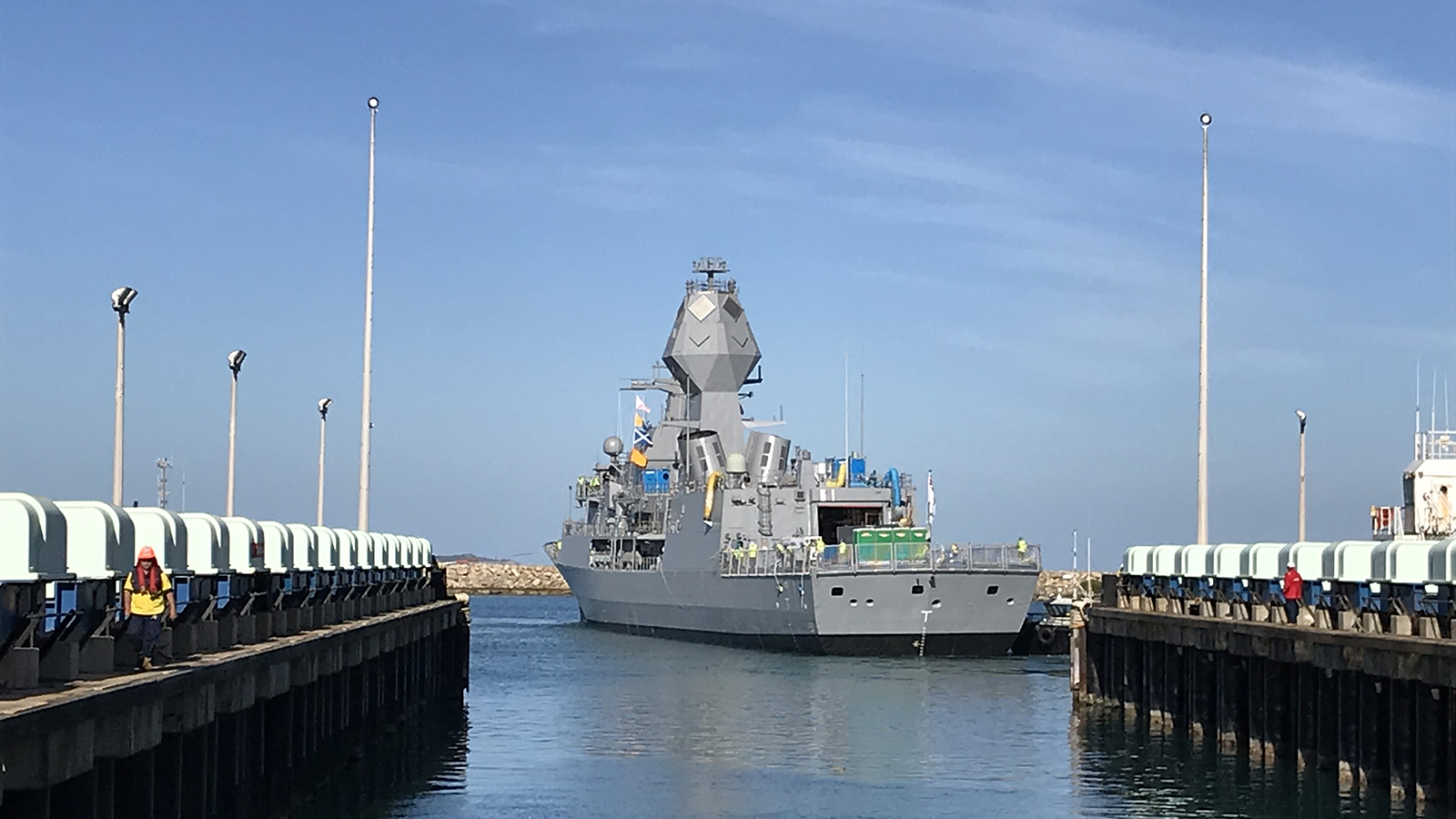 HMAS Arunta undocks from the Henderson shipyard after her AMCAP upgrade.