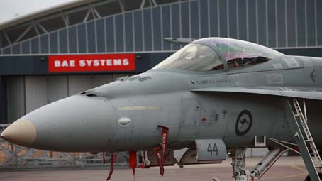 Hornet taxiing in front of hangar, New South Wales