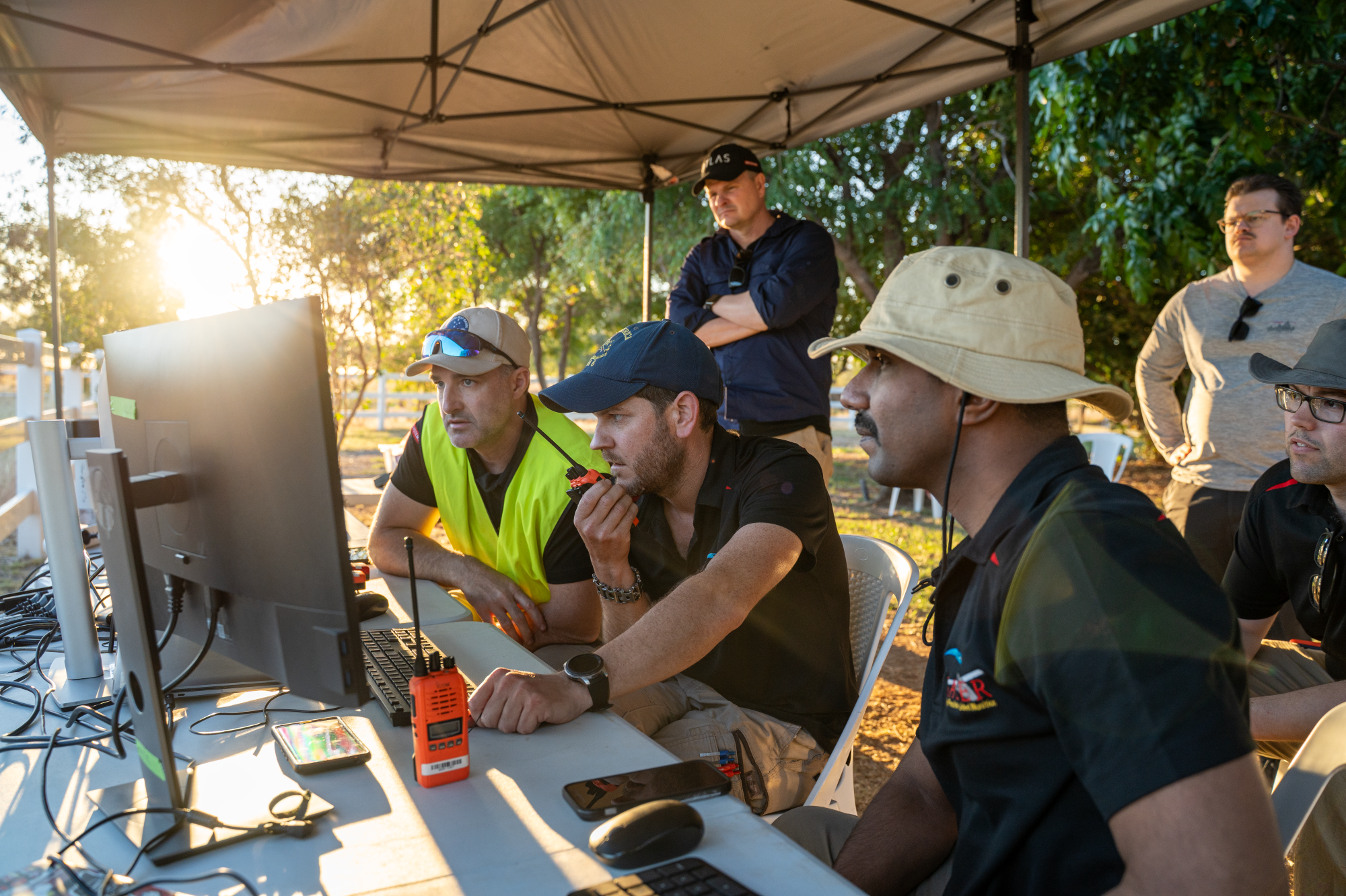 Team members watching as RAZER Low-Cost Precision Guided Munition (LCPGM) hits its target at the flight certification in Cloncurry, Queensland
