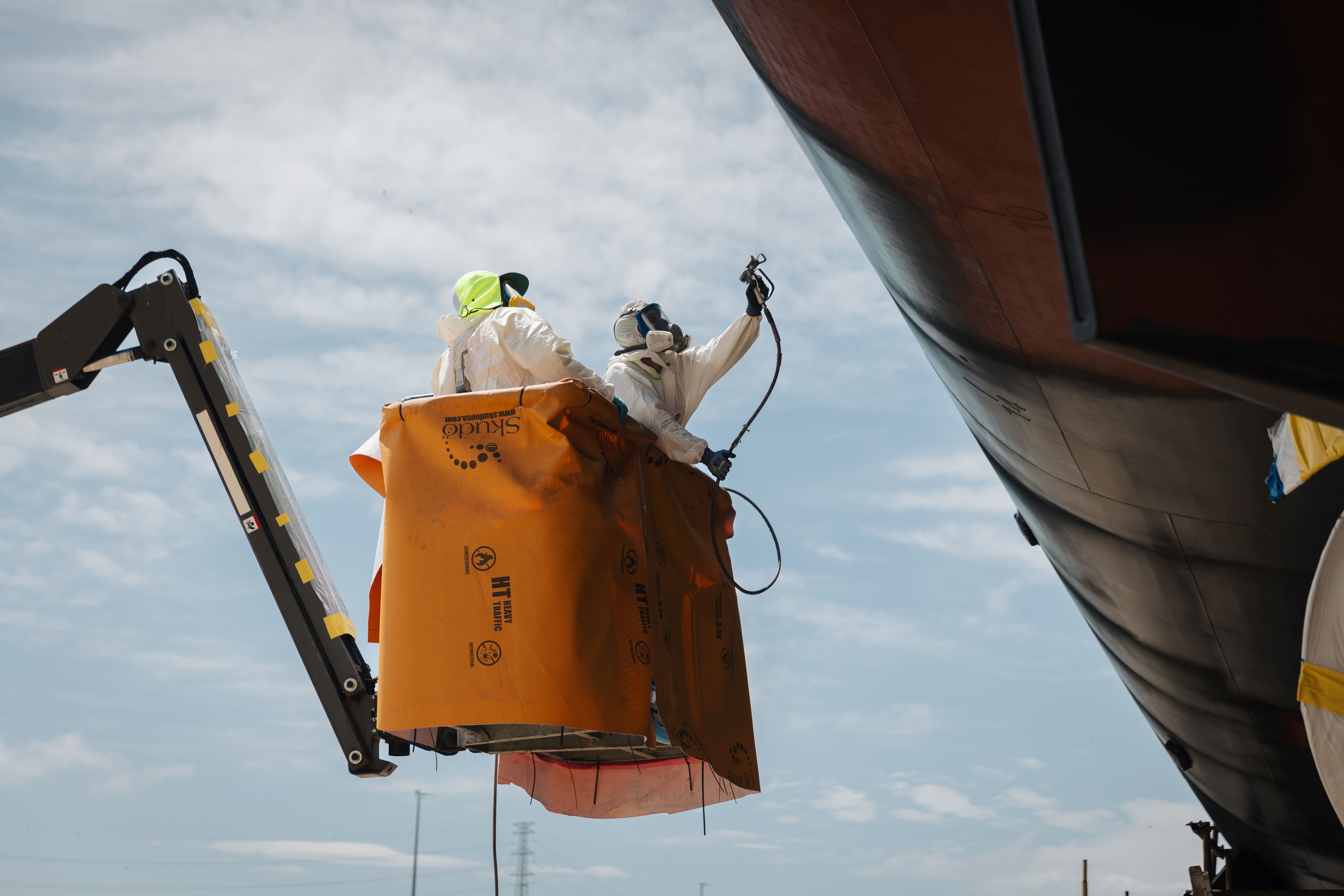 Eptec Defence Solutions abrasive blast and paint, workers on a crane