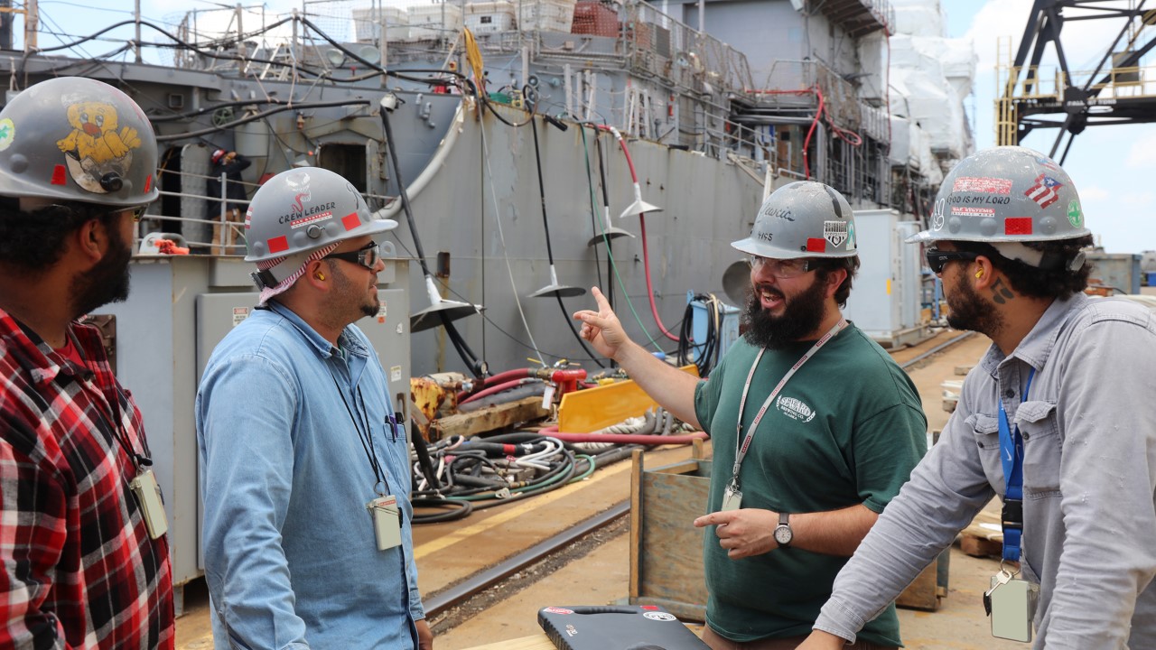 Steven Yewcic (3rd from the left)