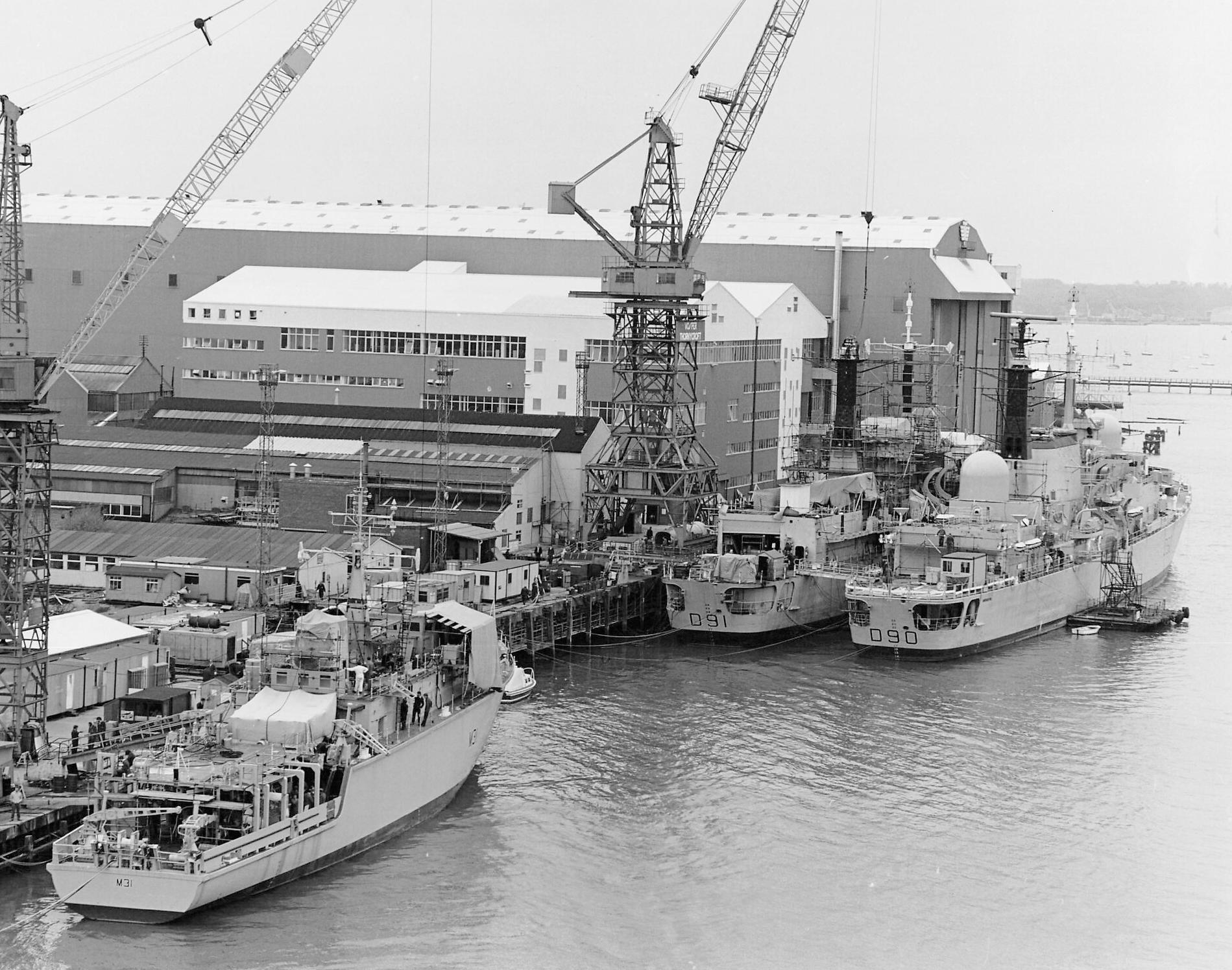 Vosper Thornycroft Woolston yard with HMS Southampton D90, HMS Nottingham D91 and HMS Cattistock M31, circa 1981