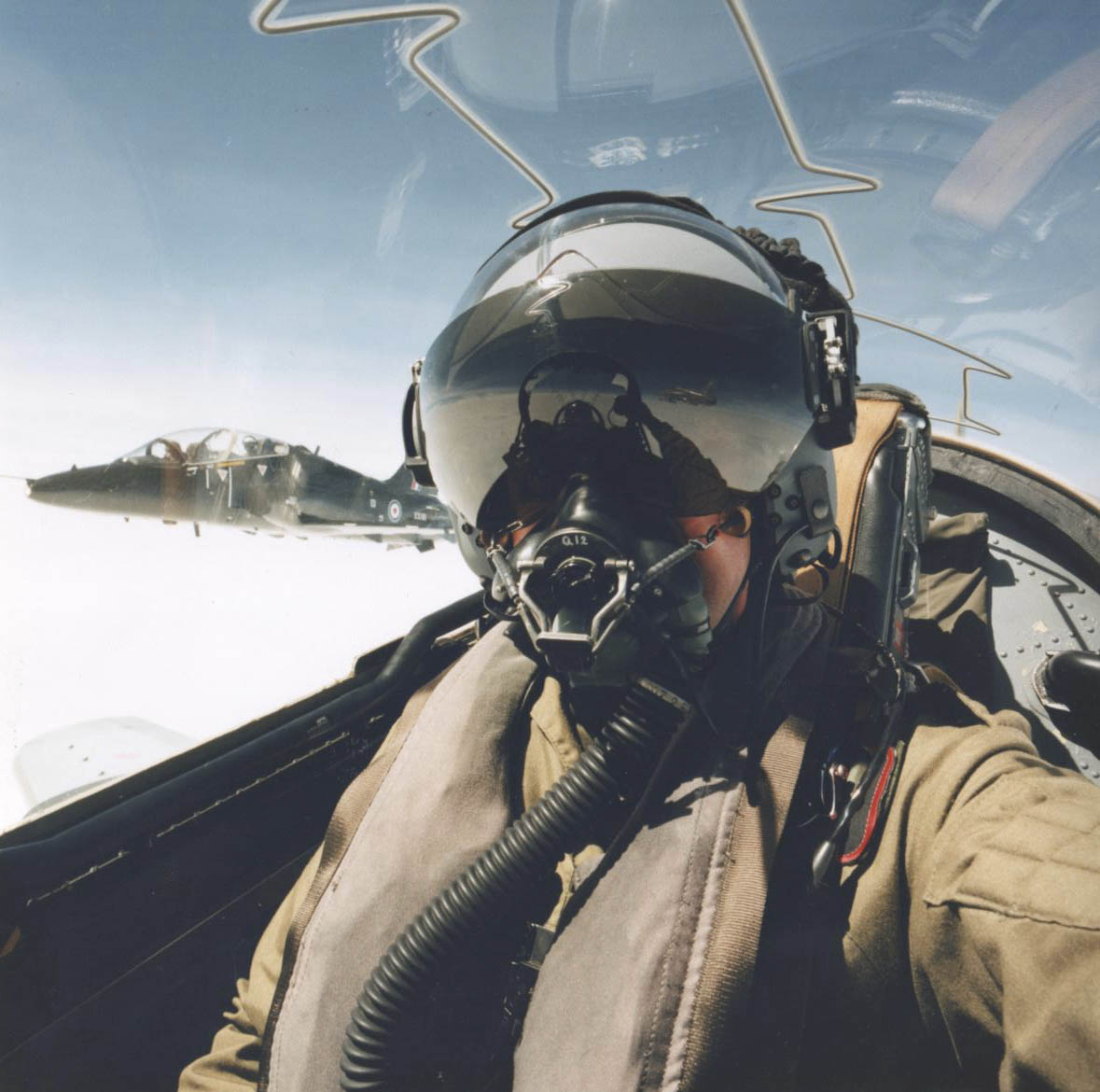 Hawk pilot in cockpit during flight
