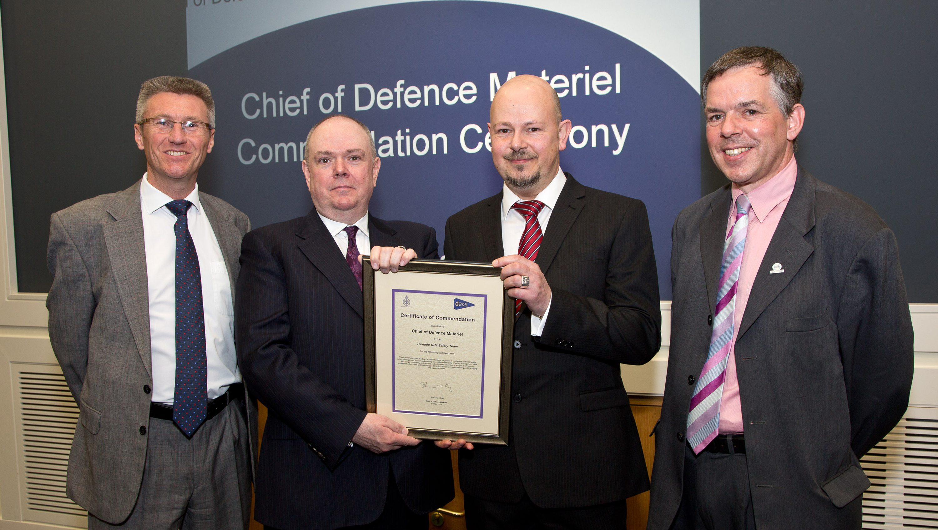 L-R: Gav Hukin, Bernard Gray (CDM), Keith Woodbridge and Gary Turner receiving the CDM commendation at Whitehall