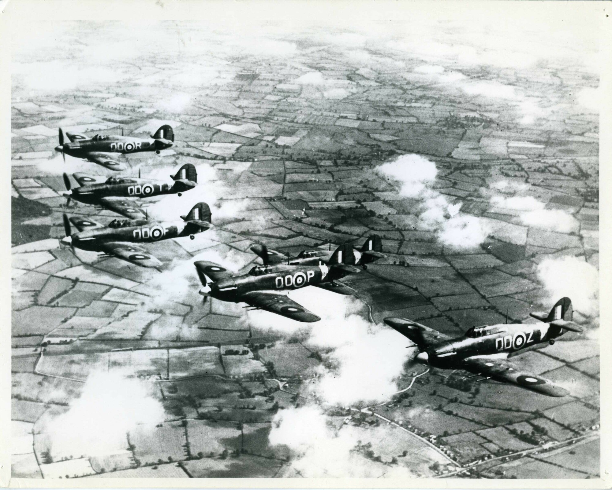 A view of six Hawker Hurricane IIC aircraft in formation.
