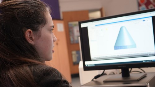 young girl working on software skills