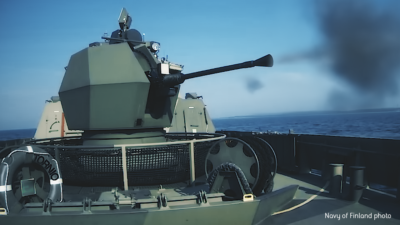 40 Mk4 naval gun firing aboard a Navy of Finland ship while out in the ocean. The Bofors 40 Mk4 naval gun is the latest generation in the 40mm family and is used by many navies and coastguards around the world. Navy of Finland photo.